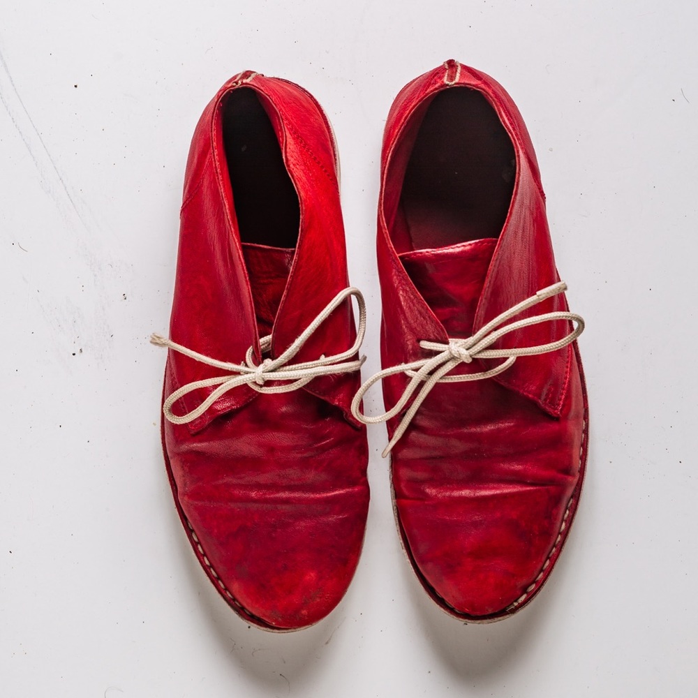 Lace up moccasin ankle boots.